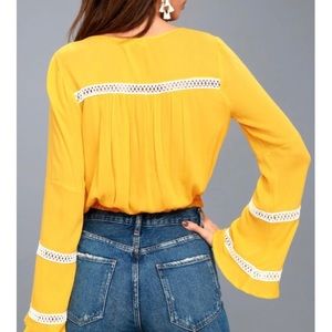 Mustard yellow crop top with crocheted detail